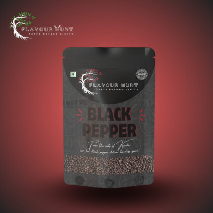 Alt Text: “Standup pouch containing whole black peppercorns. The clear pouch displays the dark, round peppercorns inside, with a label emphasizing their origin from Kerala. The background is neutral to highlight the product.”